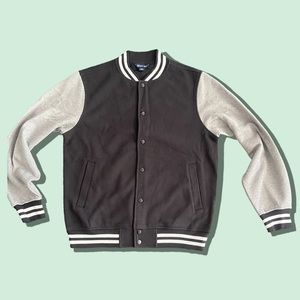 Men’s Black and Gray small varsity jacket.